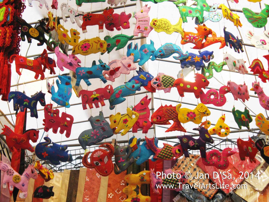 Cute stuffed toys walking on air or dancing on the ceiling