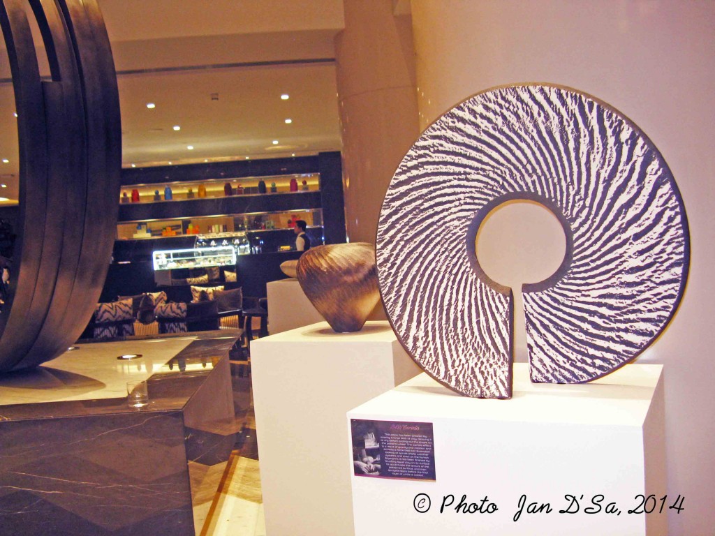 The zebra patterned sculpture by Michael Rice, as seen in the reception of Pullman Hotel